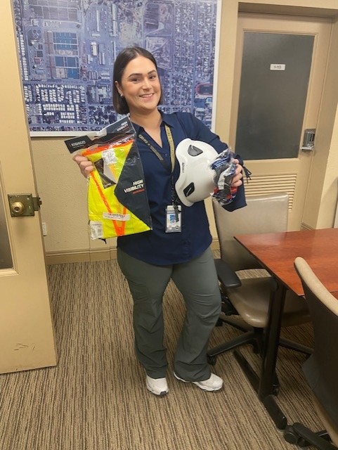 Sara Canchola, Training and Response Coordinator, getting PPE and ready to respond